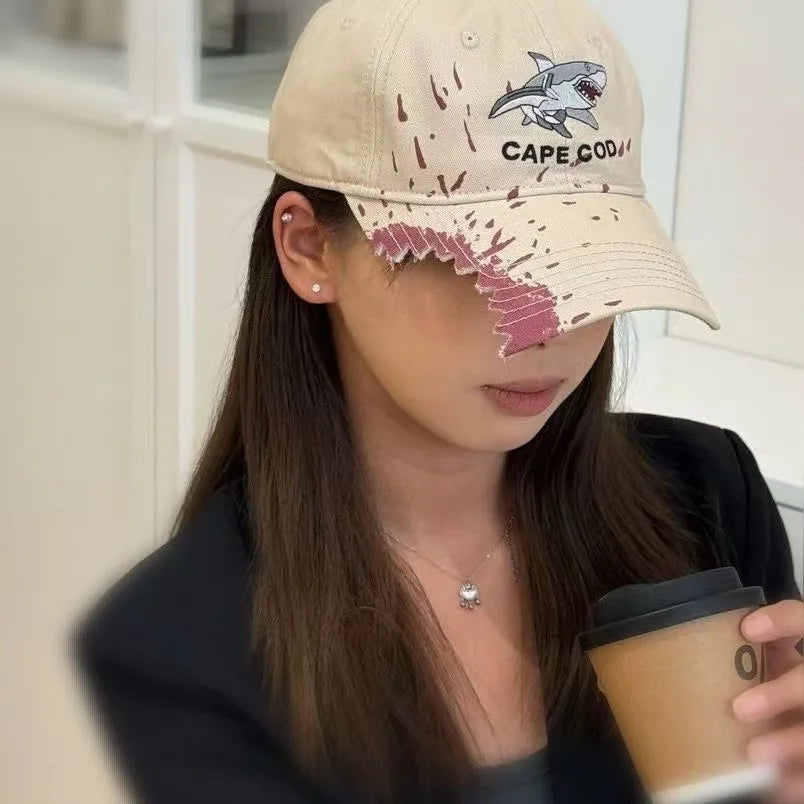 Casquette requin morsure